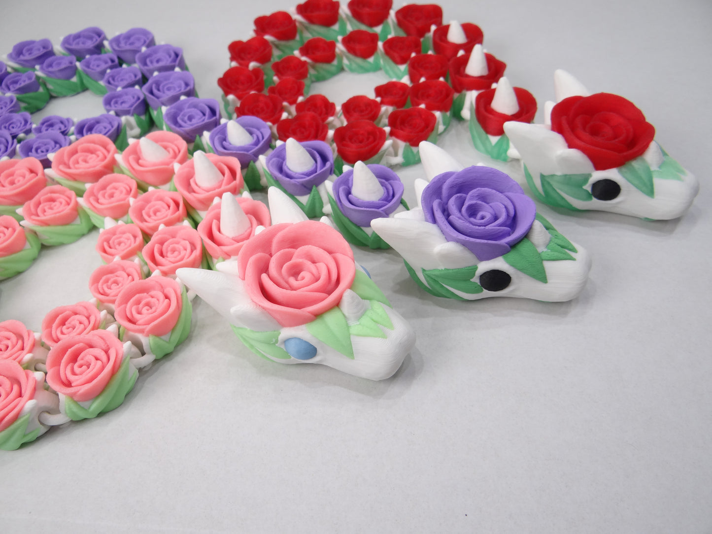 3D Printed Articulating Rose Snake β Elegant Poseable Floral Fantasy Decor