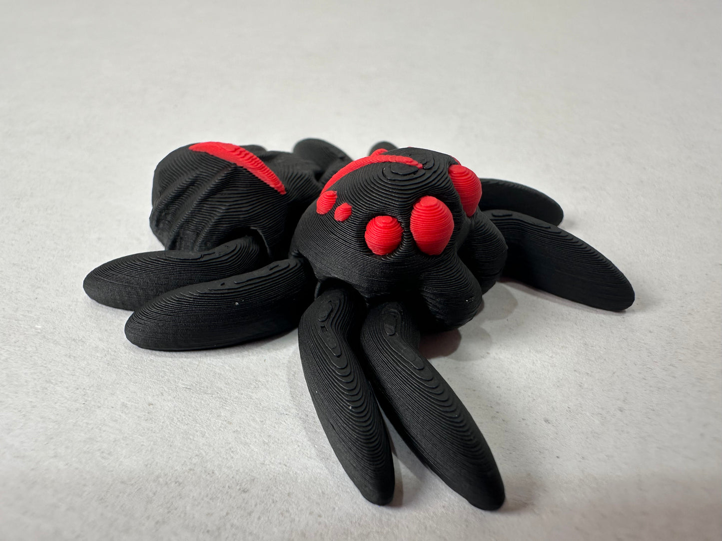 3D Printed Articulating Baby Jumping Spider – Poseable Cute Desk Pet