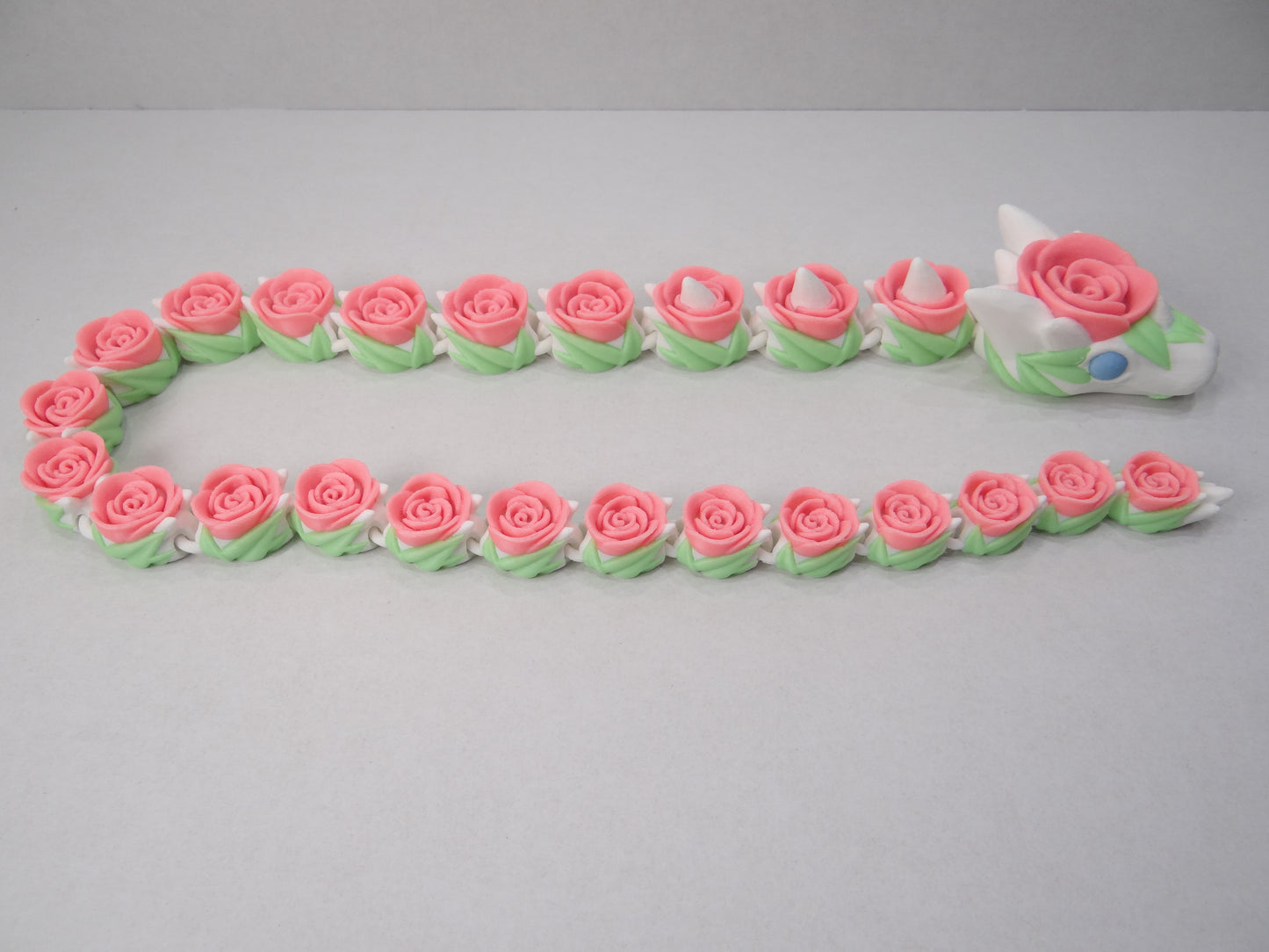 3D Printed Articulating Rose Snake – Elegant Poseable Floral Fantasy Decor