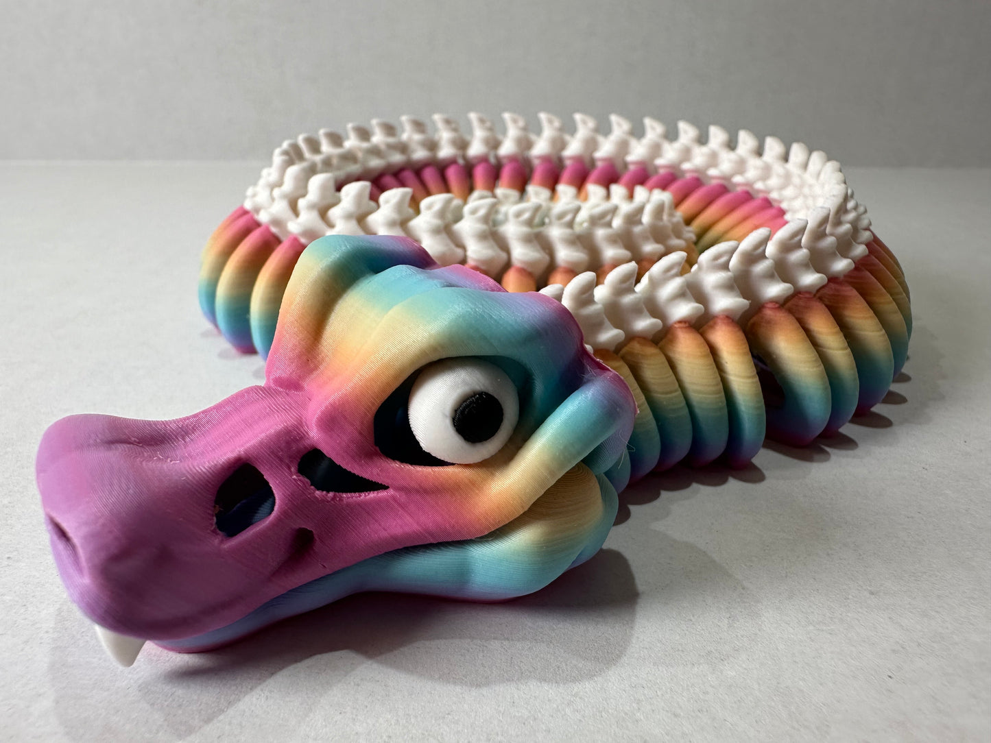 3D Printed Articulating Skeleton Snake – Poseable Serpent Model – Glow in Dark or Rainbow Gradient