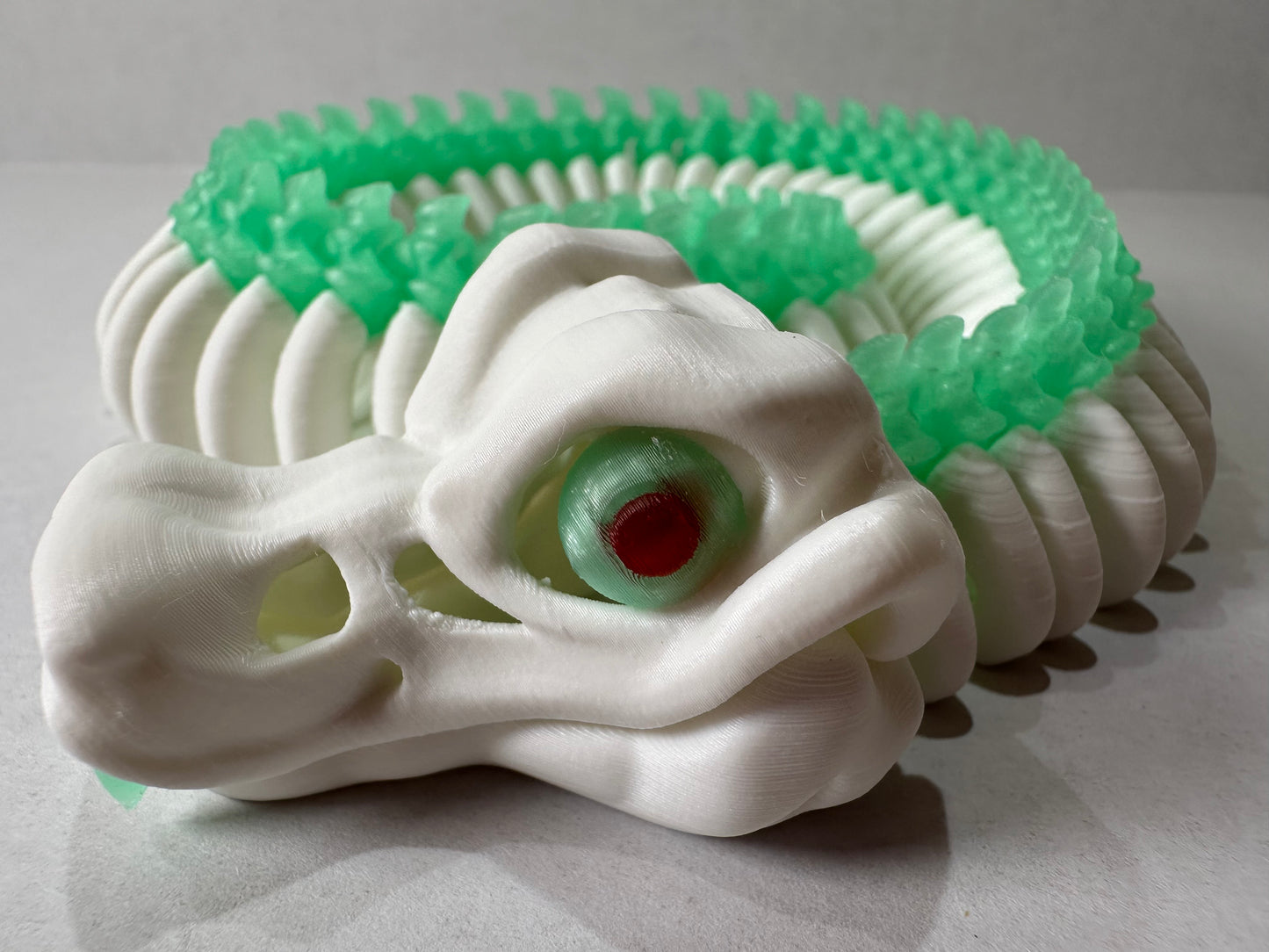 3D Printed Articulating Skeleton Snake – Poseable Serpent Model – Glow in Dark or Rainbow Gradient