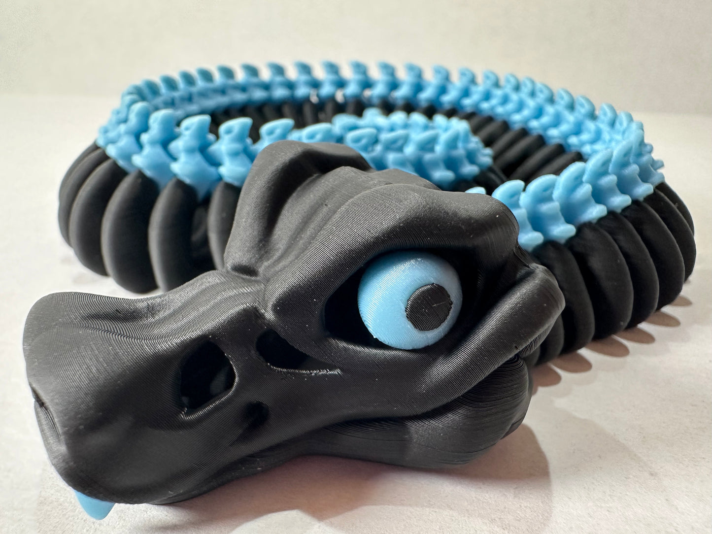 3D Printed Articulating Skeleton Snake – Poseable Serpent Model – Glow in Dark or Rainbow Gradient